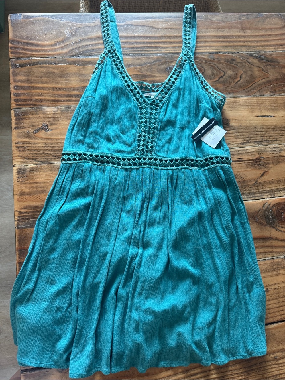 NWT O’Neil Mini Dress with crocheted detail. Size medium